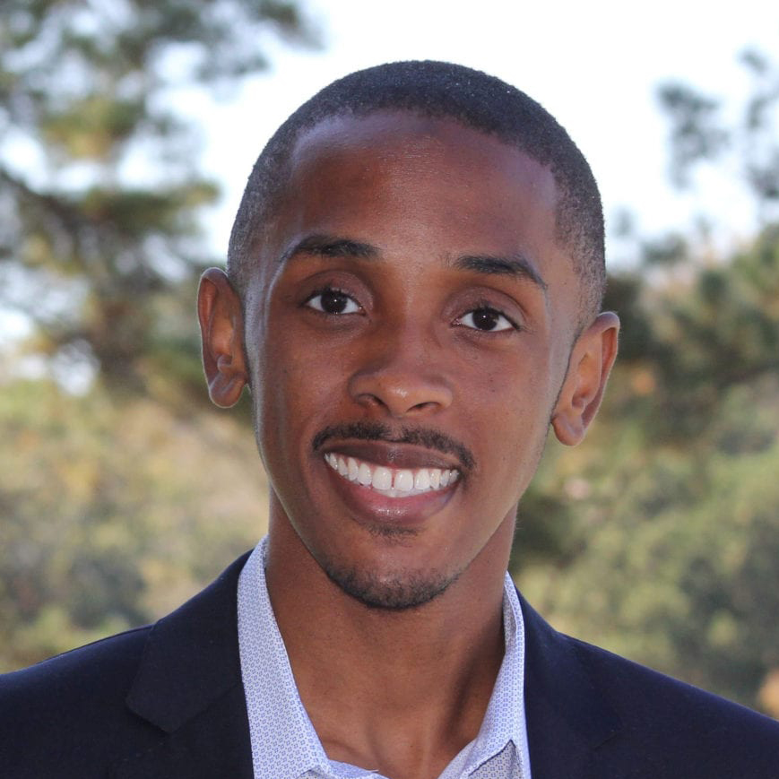 Darien Todd headshot, smiling at camera